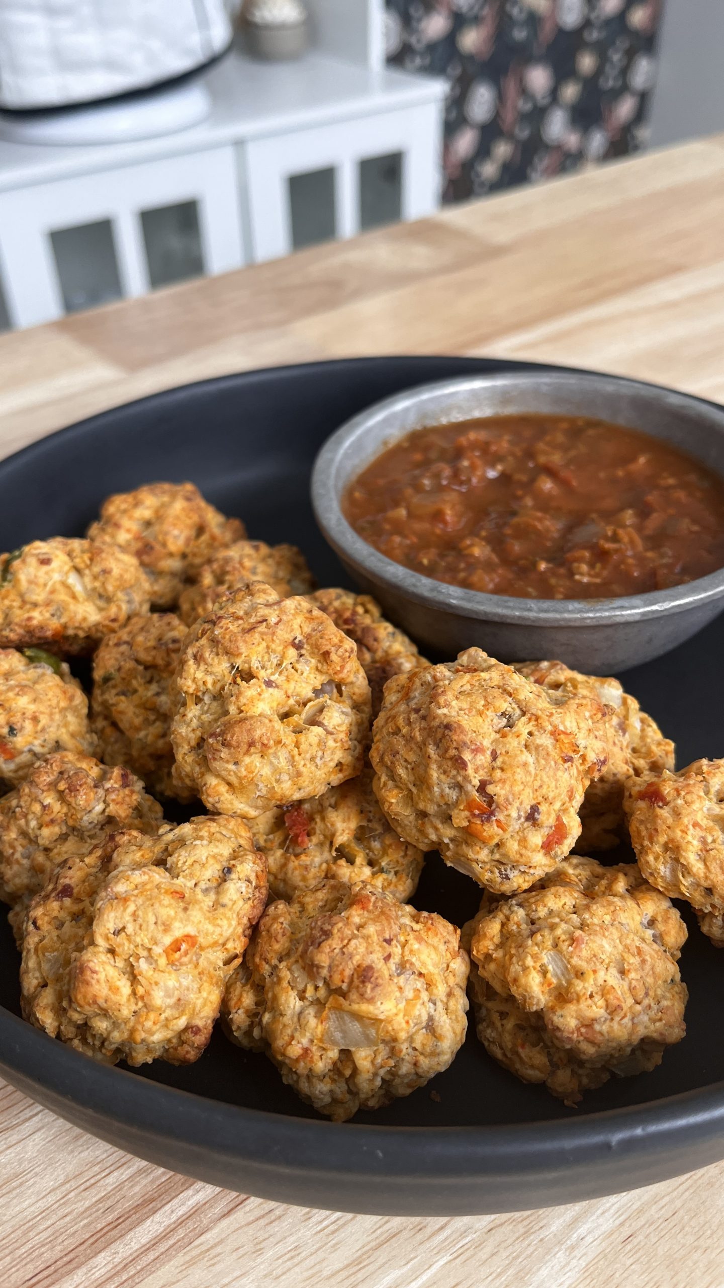 Sausage balls with salsa